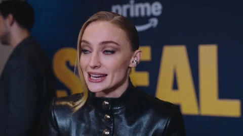I won't be watching, but I'll be rooting for you, says Sophie Turner on Game of Video stock 326360694