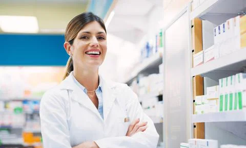 I work directly with the public to make a difference. a female pharmacist Stock Photos