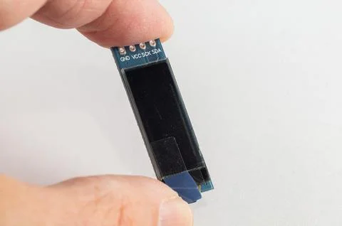 I2C OLED Display Module 0.91 Inch in hand for DIY devices Foto stock