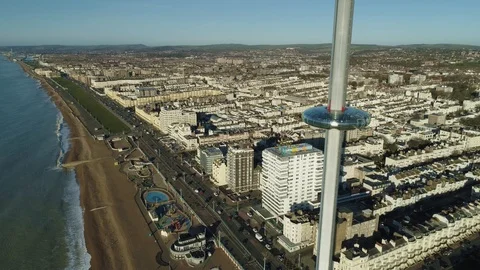 I360 viewing tower pod descending looking west beach front, drone aerial 4K Stock Footage 101204669
