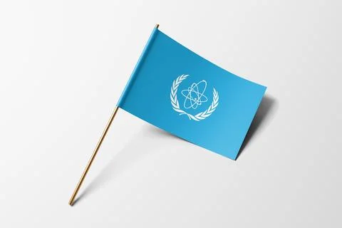 IAEA flag of small paper, isolated on white background Stock Photos