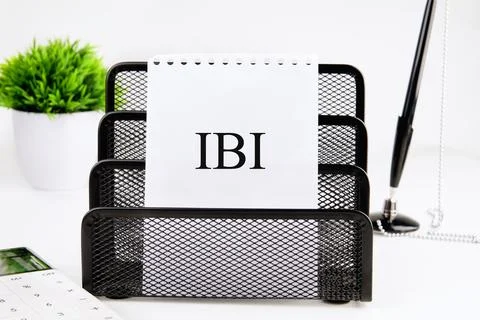 IBI (Inter beat Interval) written on a blank sheet in a black stand on a whit Foto stock