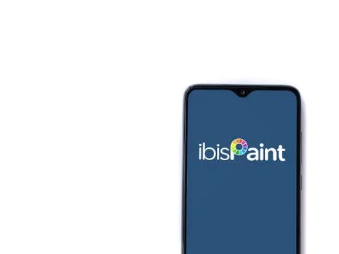 Ibis Paint X app launch screen with logo on the display of a black mobile sma Stock Photos