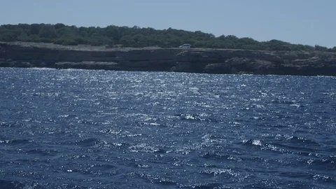 Ibiza Package 2 | slow motion coastline waves in blue sea ocean Stock Footage 117346357