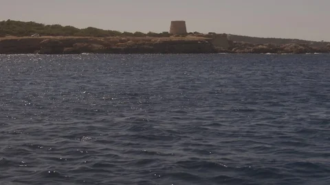 Ibiza Package 79 | slow motion waves in blue sea ocean rocky mountain coastline Stock Footage 118710103