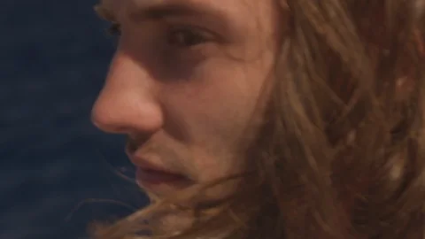 Ibiza Package 86 | slow motion man boy closeup long hair waving in wind Stock Footage 118710237