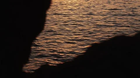 Ibiza Sunset Waves Framed by Rocks 動画素材 331225911