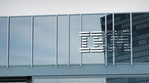 IBM Stock data presented on the logo of the office facade editorial Stock Photos