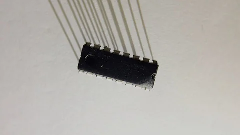 IC electronics chip component macro shot Rotating Turning Stock Footage 126079535