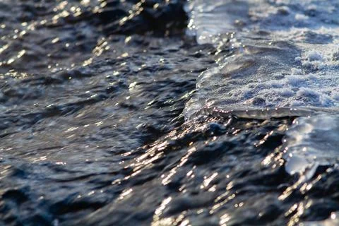 Ice and fast flow Stock Photos