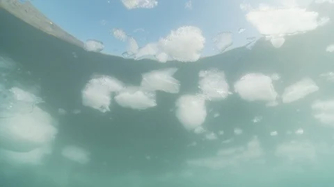 Ice and floe in the Arctic Ocean – Underwater shot Stock Footage 100599435