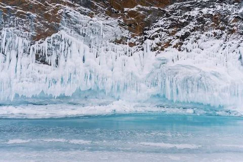 Ice and icicles on the rocks of Ogoy island, Baikal lake, Siberia, Russia. Great Stock Photos