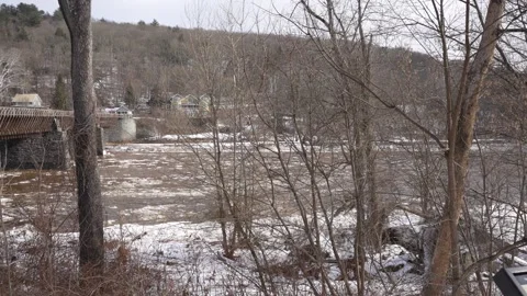 Ice and snow float on river Stock Footage 237838492