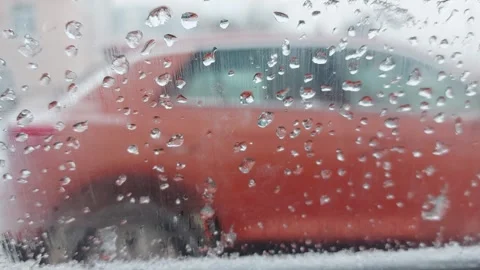 Ice and snowflakes on the side window of a car from the inside against the Stock Footage 269332085