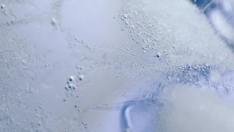 Ice and water abstract texture. Frozen aqua and air bubbles Vídeos de archivo 114066459