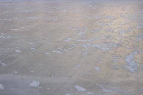 Ice background with marks from skating and hockey, blue texture Stock Photos