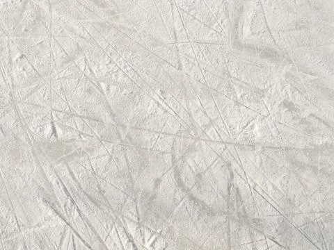 Ice background with marks from skating and hockey. Stock Photos