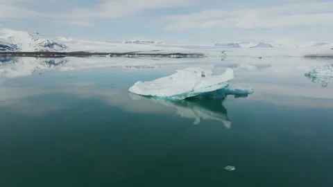 Ice berg floating in front of a glacier 4K 50FPS Stock Footage 218272363