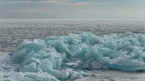 Ice blocks covering the lake. Winter time. Stock Footage 329096059