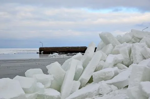 Ice blocks at pier Stock Photos