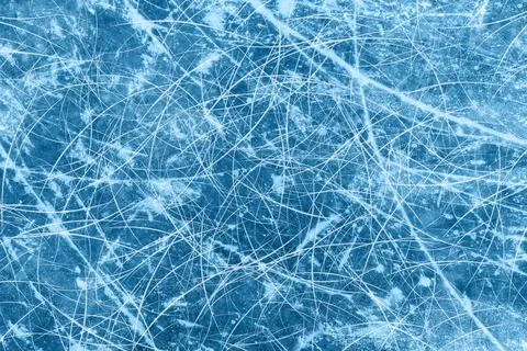 Ice blue background with ice skating tracks. Stock Illustration
