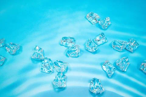 Ice on blue background 写真素材