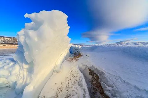 Ice on blue sky background Foto stock