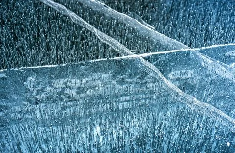 Ice blue texture. Broken ice background. Stock Photos