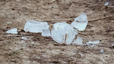Ice breaking on the earth ground Stock Footage 327763543