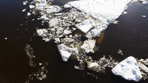 Ice broken floats on the water Stock Footage 193611268