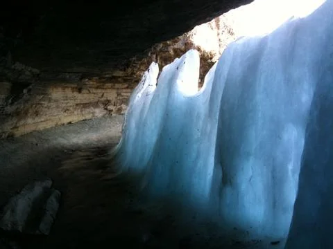 Ice Build Up under a Waterfall Stockfoto's