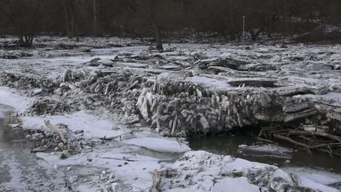 Ice buildup, stacks of ice blocks at Humber River Stock Footage 105056834