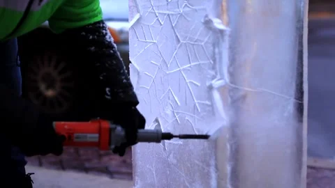 Ice Carving Chainsaw Snowflake Pattern Carving Slider Push In Video stock 347969459