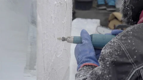 Ice Carving with a power tool. Ice sculptures. Stock-Footage 61243590