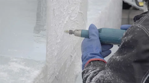 Ice Carving with a power tool. Ice sculptures Stock-Footage 61244340