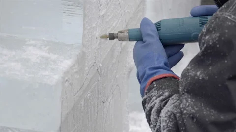 Ice Carving with a power tool. Ice sculptures. Stock Footage 61244918