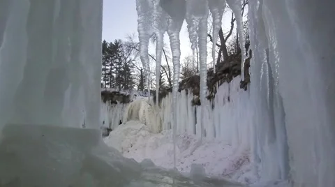 Ice Cave and Waterfall Twilight Stock Footage 63105506