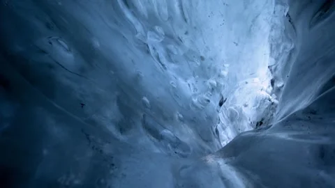 Ice cave tunnel from empty glacier river of a melting glacier in Iceland Stock Footage 260599609