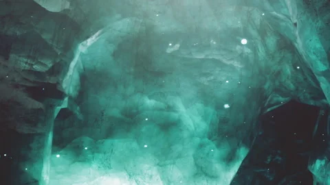 Ice cave with turquoise walls and shimmering lights in a remote place Stock Footage 344864662