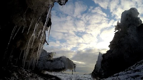Ice cave on the water under the bridge in Eyrarbakki Iceland Stock Footage 118276557