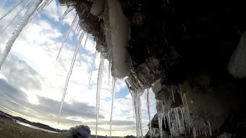 Ice cave on the water under the bridge in Eyrarbakki Iceland Stock Footage 118276842