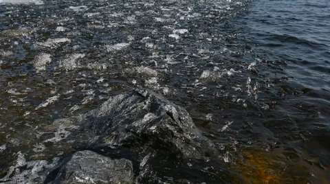 Ice chips floating in clean spring river Stock Footage 62319841