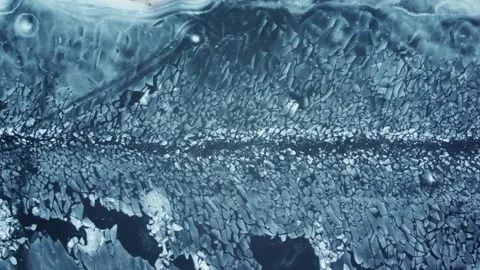 Ice chunks floating down a river in the middle of winter Stock Footage 226914465