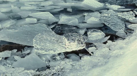 Ice chunks floating in lake 5 Stock Footage 2211872