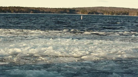 Ice chunks floating in lake 6 Stock Footage 2210650