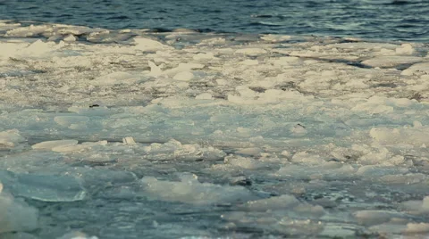 Ice chunks floating in lake 7 Stock Footage 2209496