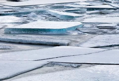 Ice chunks on a frozen river Stock Photos
