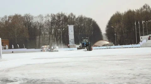 Ice cleaning machine cleans the ice on skating rink. Stock Footage 56541970