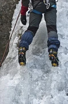 Ice climber in action Stock Photos