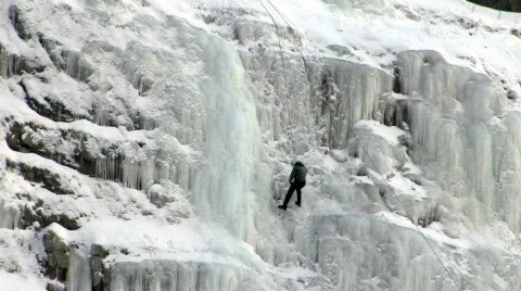 Ice climber going down HD Stock Footage 93066